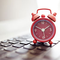 A Little Background - Clock & Laptop